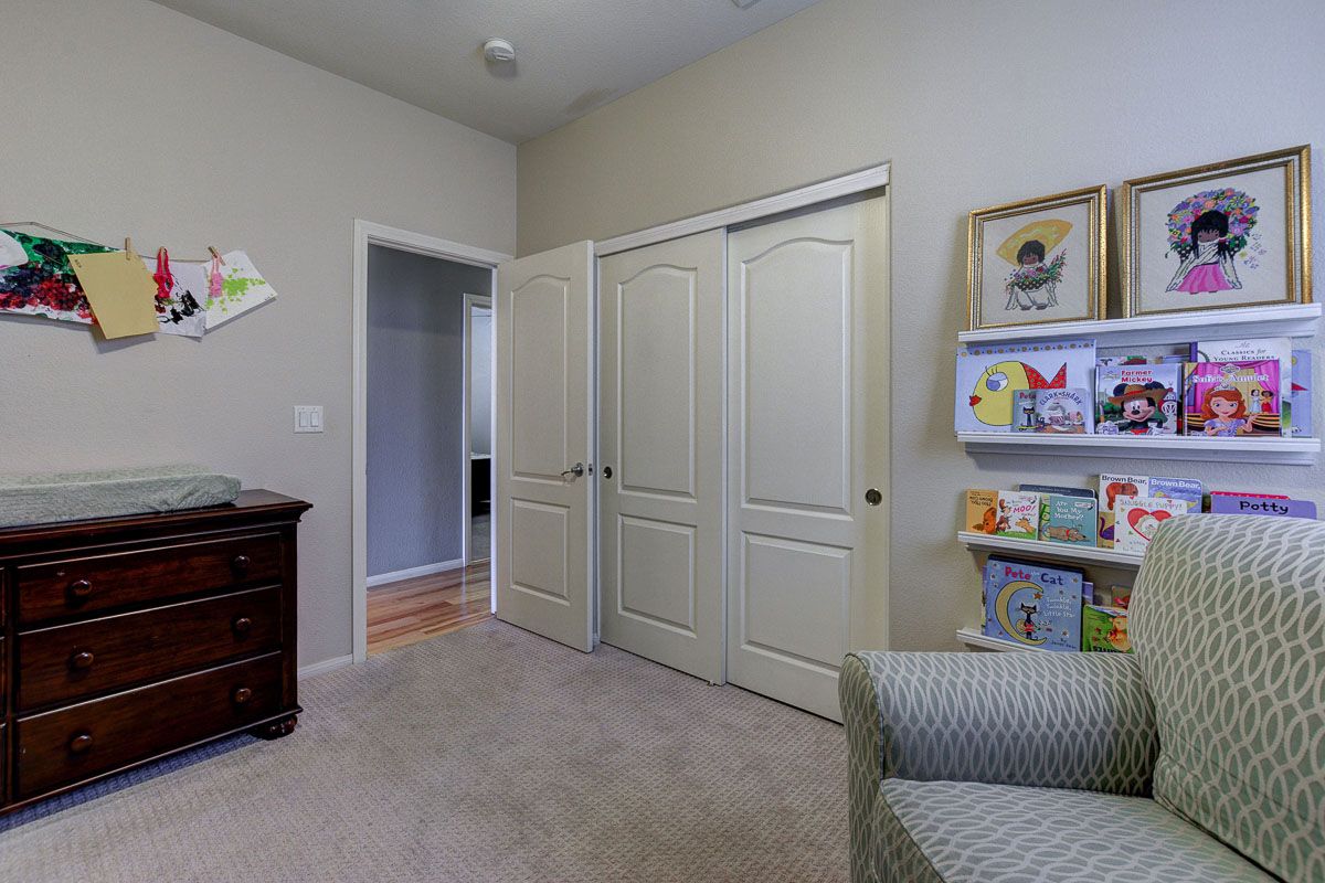 Sizable bedroom with ceiling fan